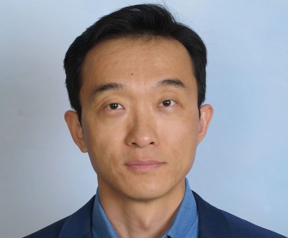 Image shows the face of UOP faculty member Dr. Long Wang.