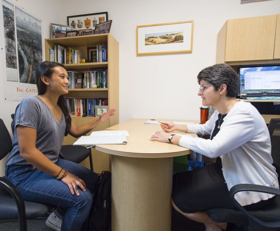 faculty advisor with student