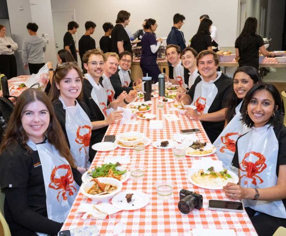 Group of students at Cioppino Dinner