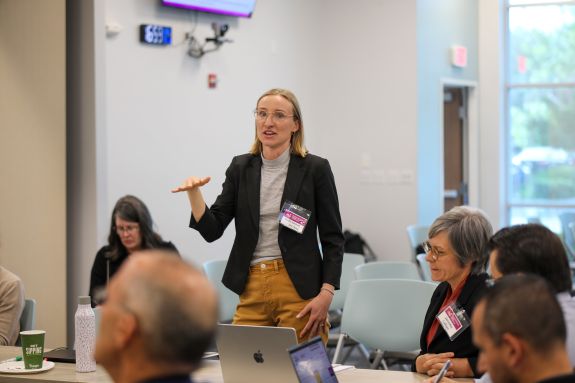 Speaker engaging with students.
