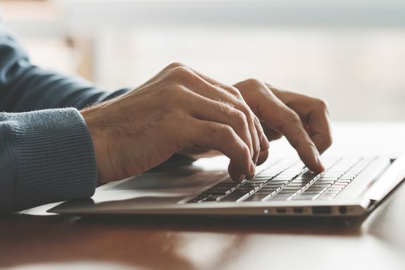 hands on a keyboard