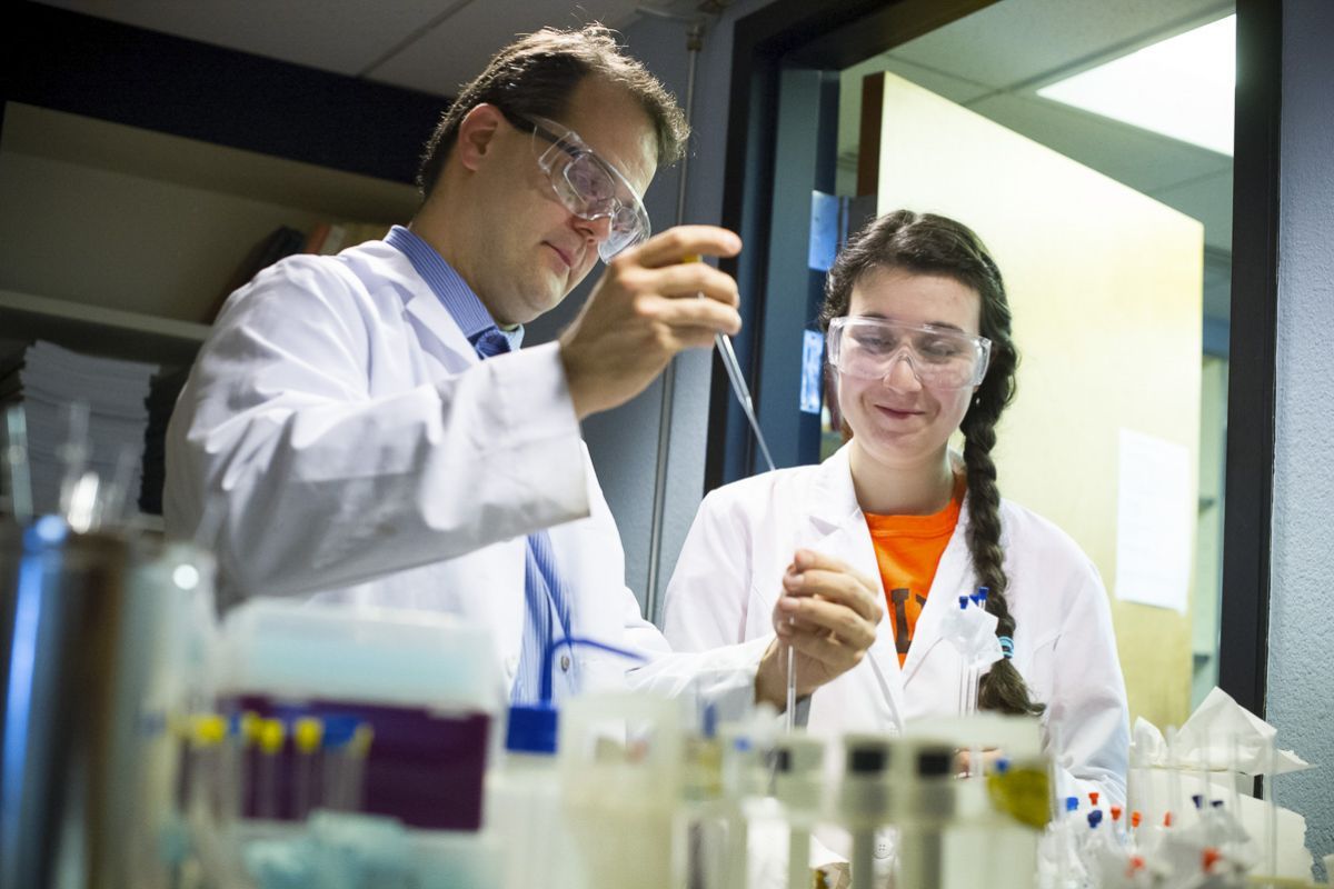 Student and professor in lab