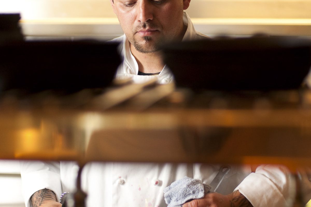 cook making stir fry