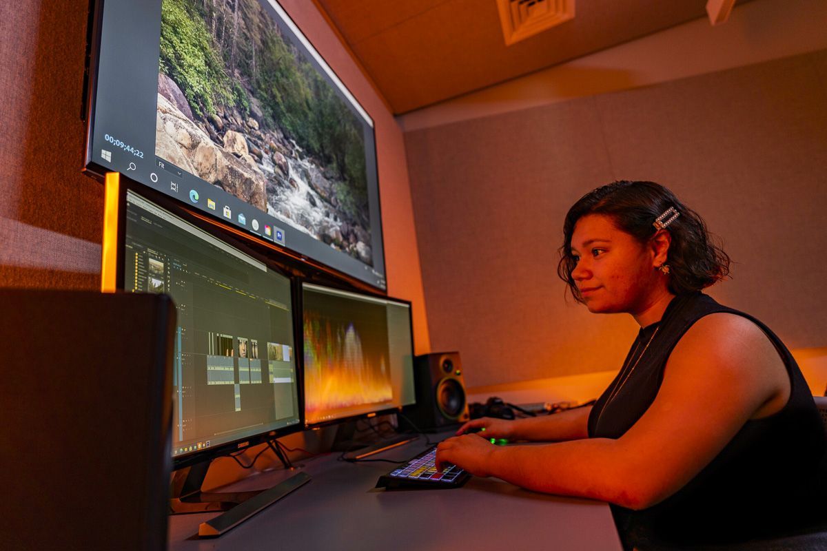 Student April Chai in the MPRO edit space
