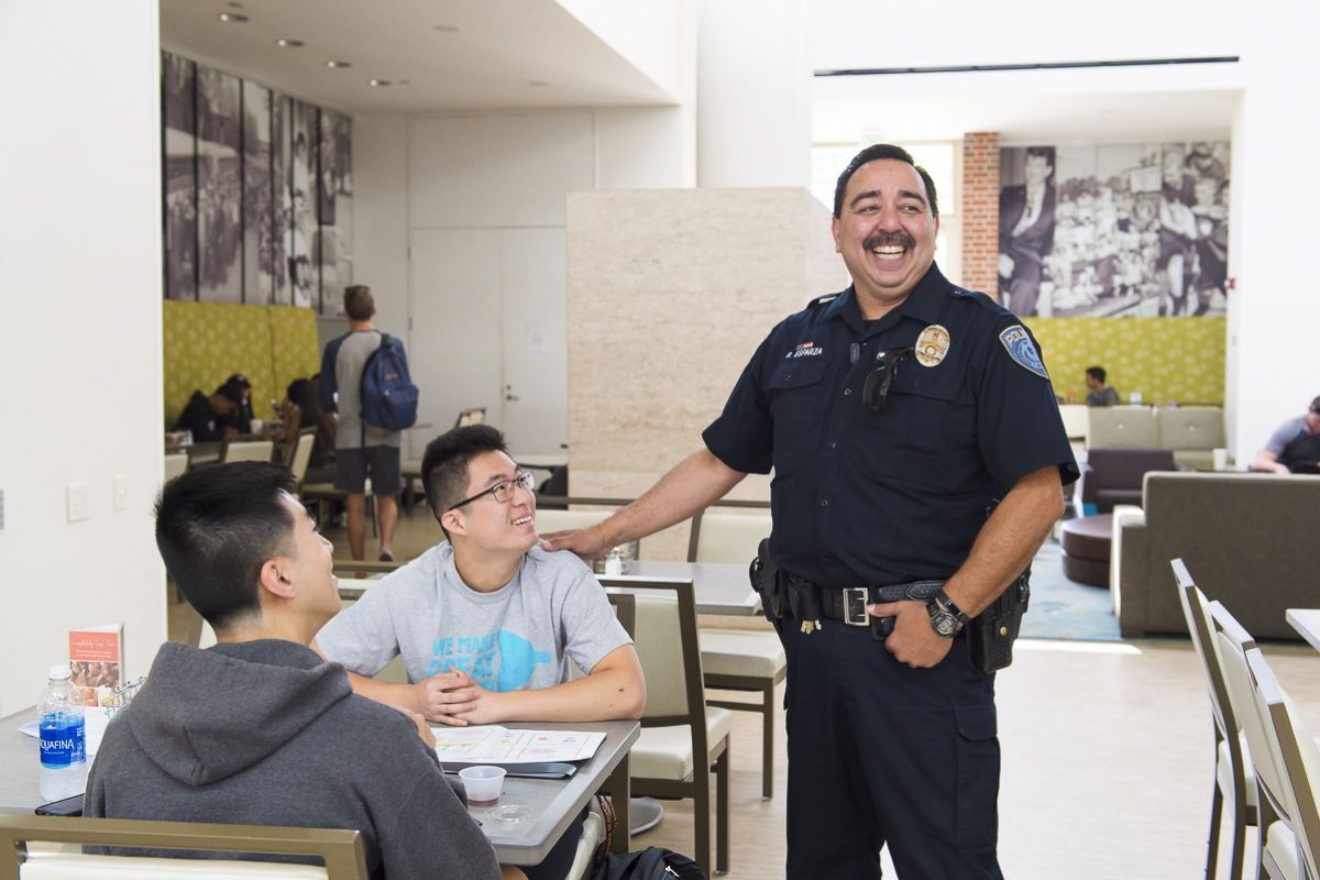 a public safety office talks to students