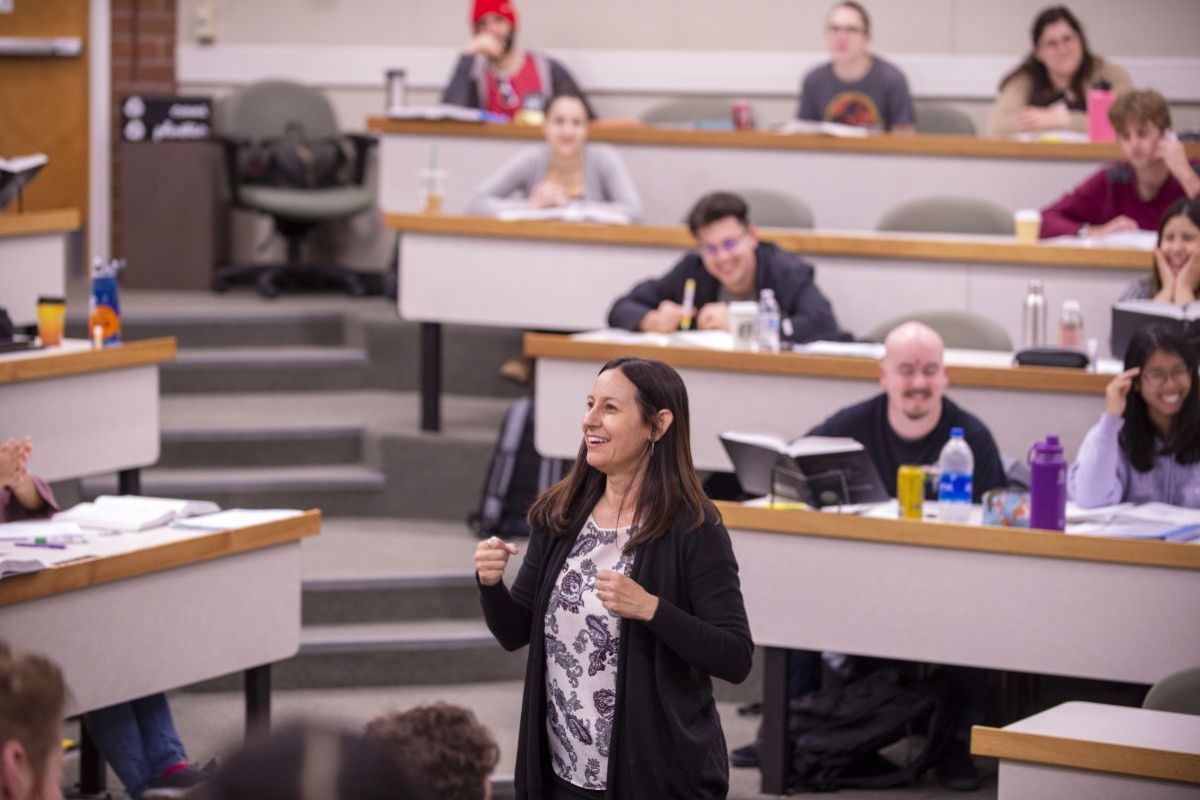 A teacher speaking to a room of students