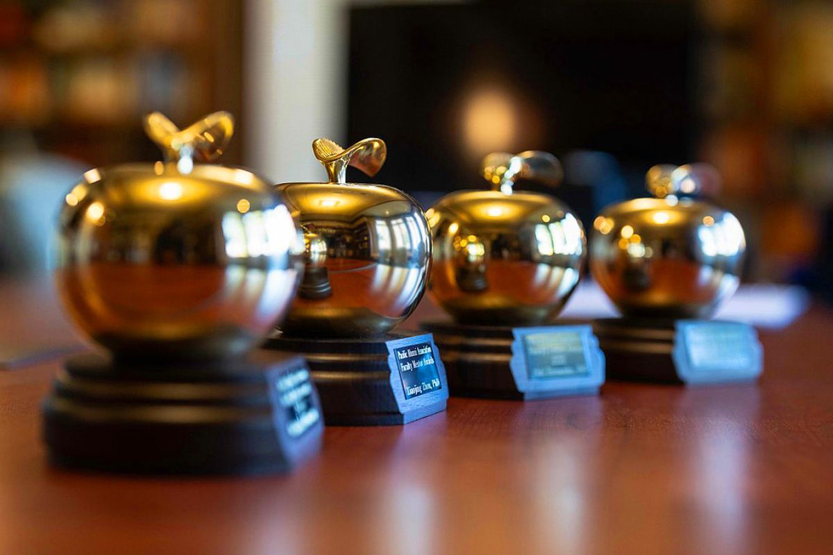 bronze apple-shaped awards