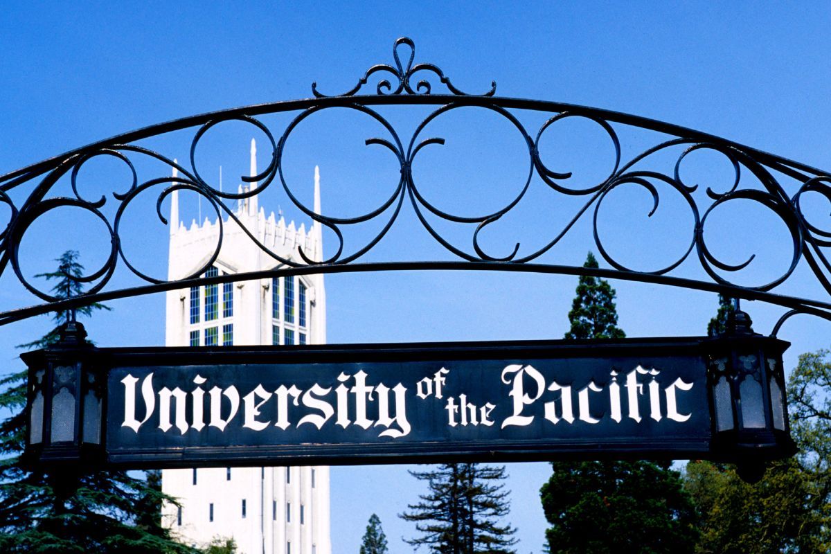 university gate with tower in the background
