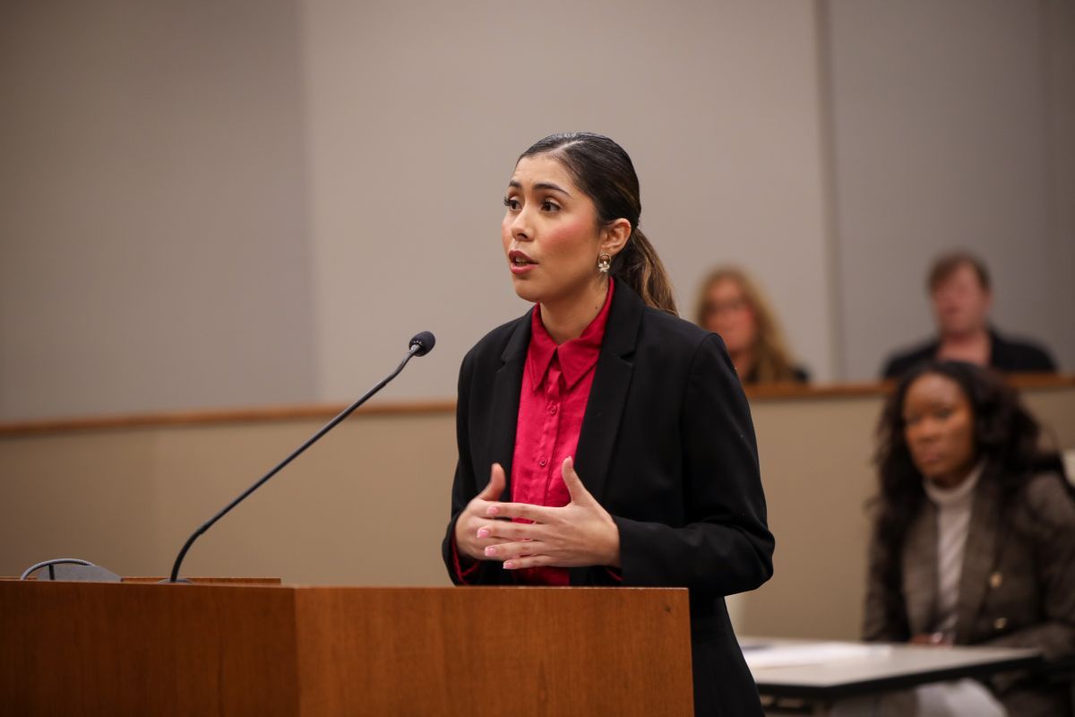 woman standing at a podium