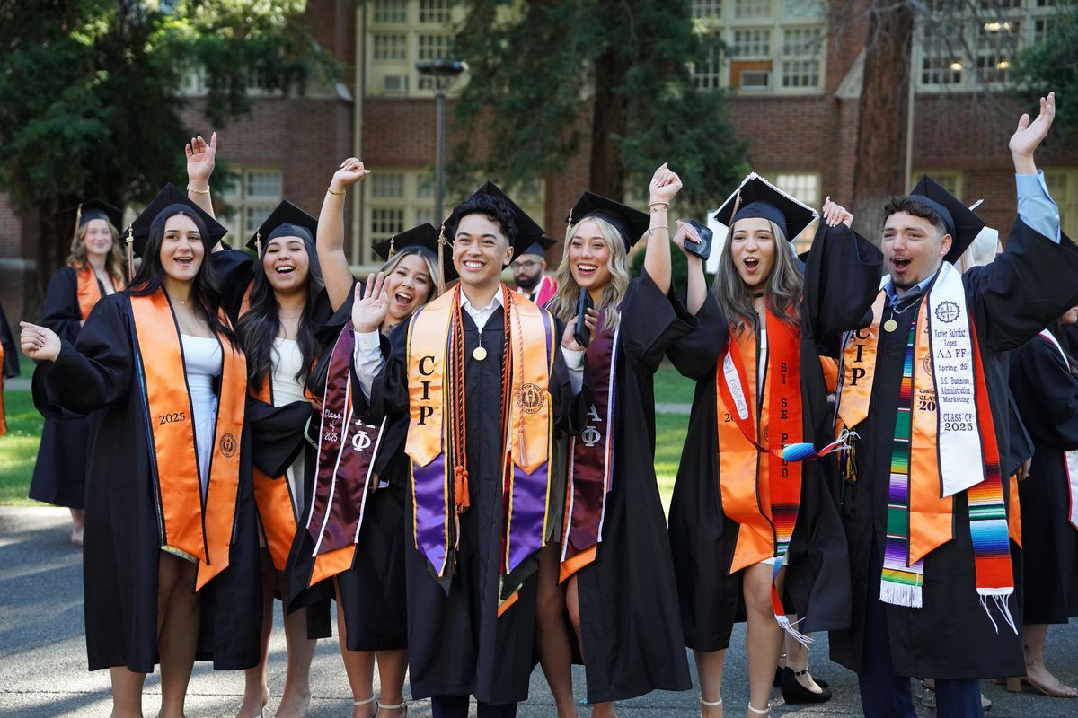 Jubilant Pacific graduates