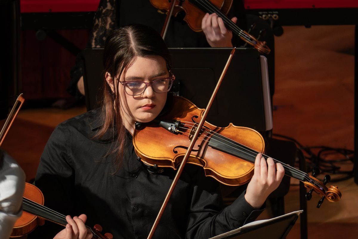 Student playing the violin
