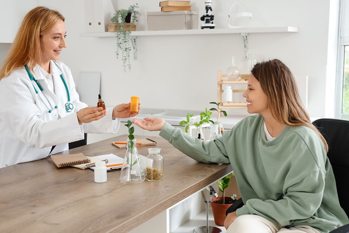 Pharmacist counseling patient on homeopathy