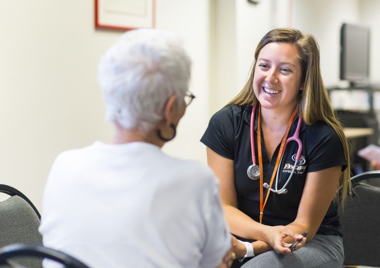 a student working with a patient