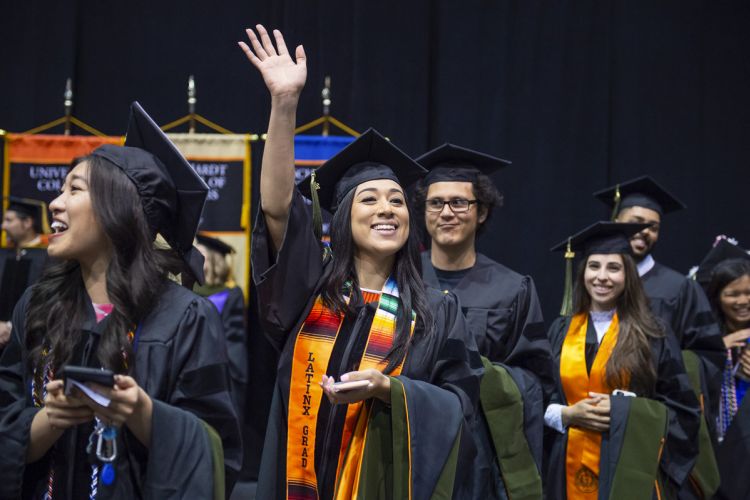Hispanic pharmacy graduate at Commencement