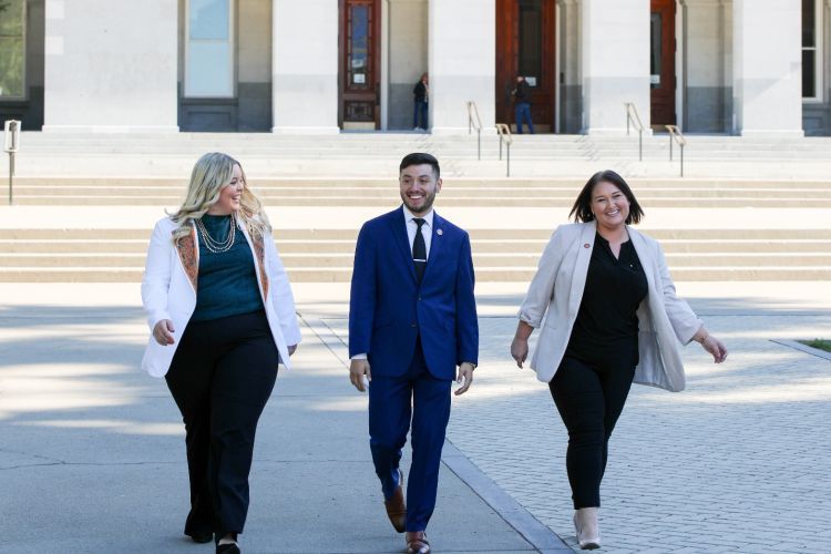 (From left to right) McGeorge students Bailey Morrell, Christian Landaverde, and Katelyn Rader are pictured in front of the California State Capitol Building, which is located 3.1 miles away from the law school’s campus in Sacramento.