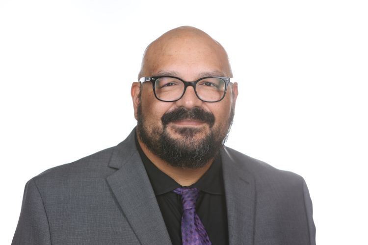 a male wearing business attire.