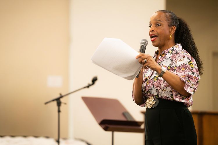 Mary Lomax-Ghirarduzzi speaks to faculty, staff and students during the annual DEI retreat. 