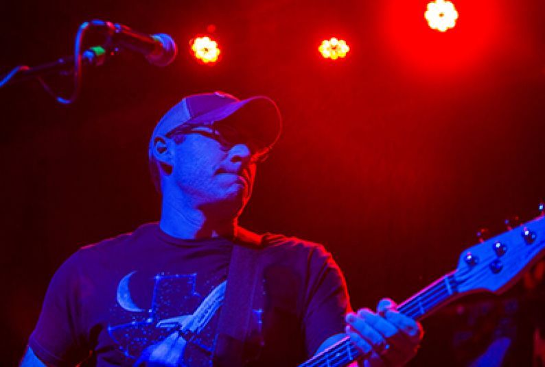 Benom Plumb with Guitar