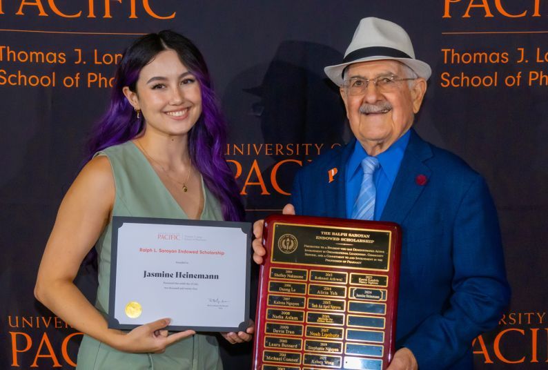 Ralph Saroyan with scholarship recipient Jasmine Heinemann ’23, PharmD