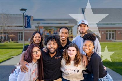 a group of students pose for a picture together