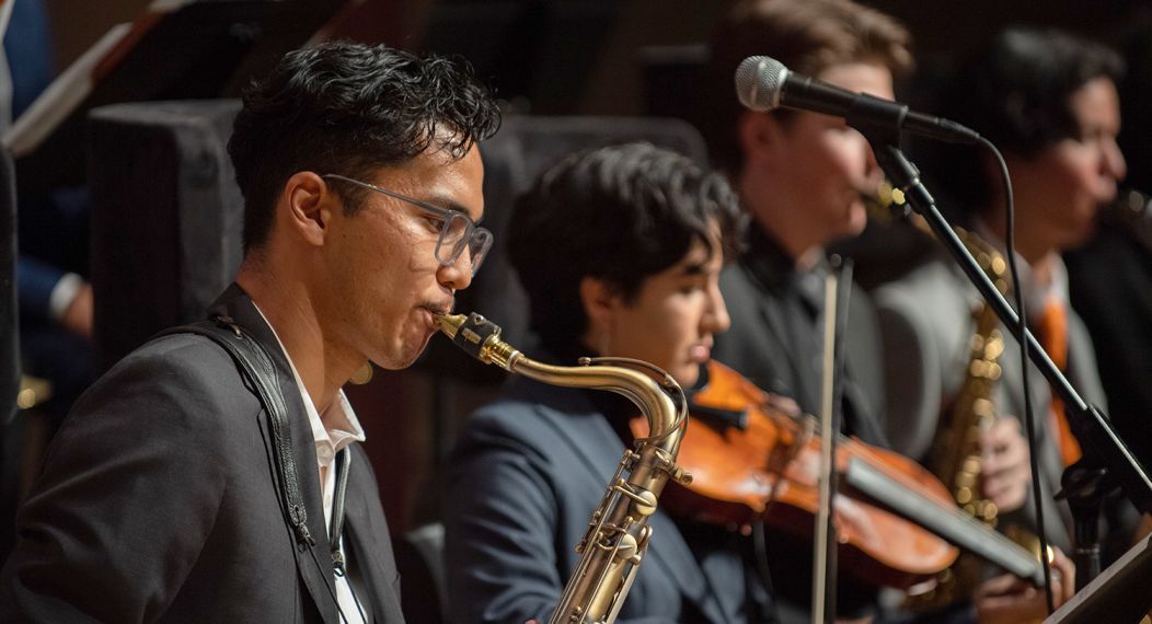 jazz students performing on saxophone and violin