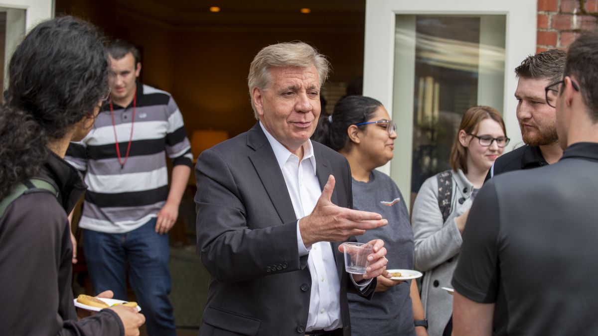 President Christopher Callahan talks with Pacific students. 